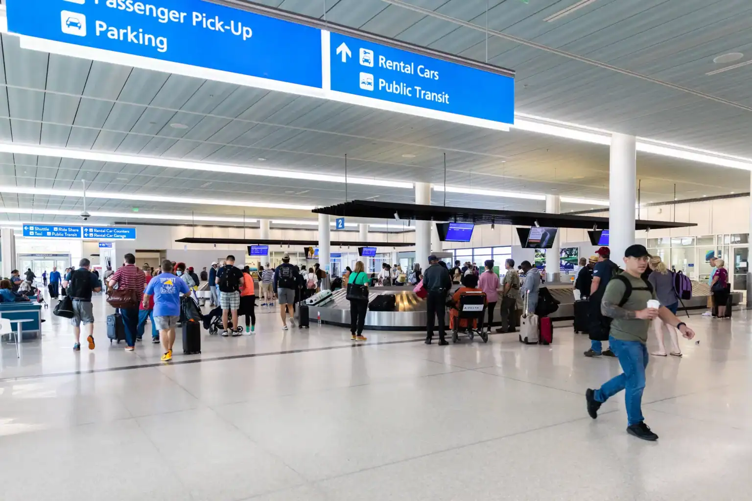 Passengers in baggage claim at Charleston airport
