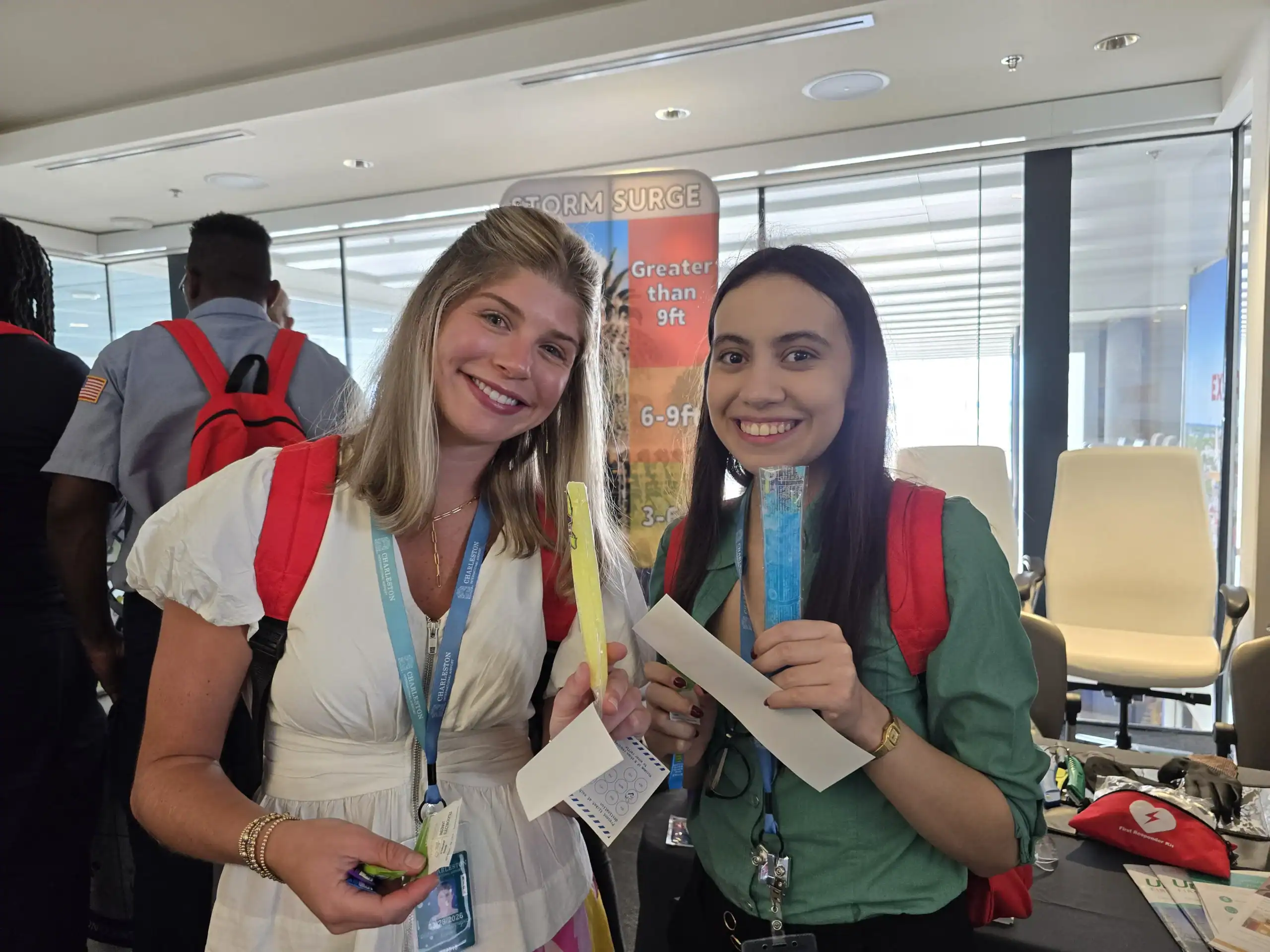 Two young adult interns posed for a photo